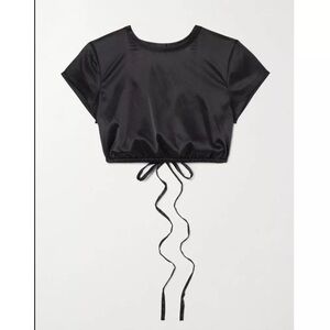 Skims shine satin crop top in black with open back